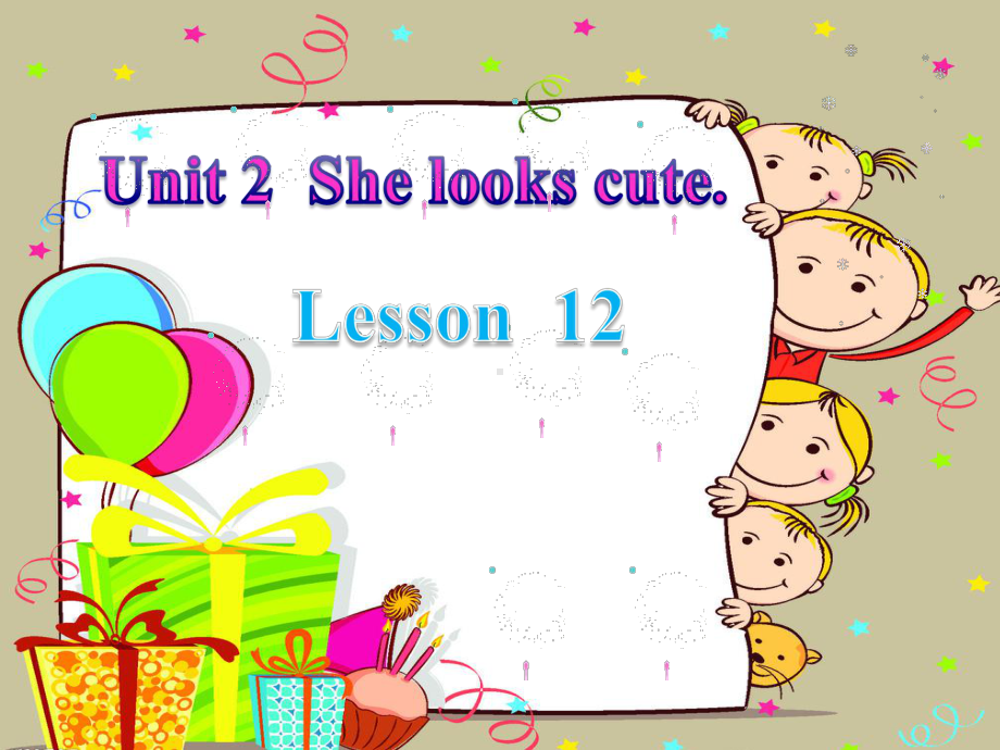 人教精通版五年级上册Unit2 She looks cute(Lesson12) ppt课件.ppt_第1页